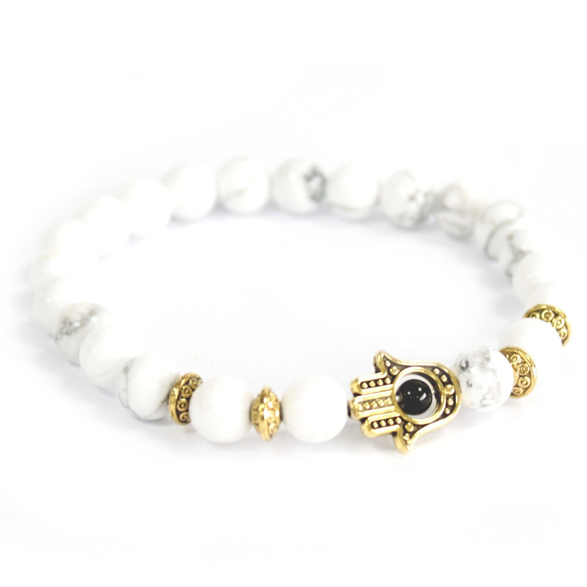 Goudkleurige armband Hamsa met witte steen