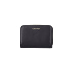 Calvin Klein portemonnee zwart met knopen • zakken: binnenzakken • size (cm): 11x8x3