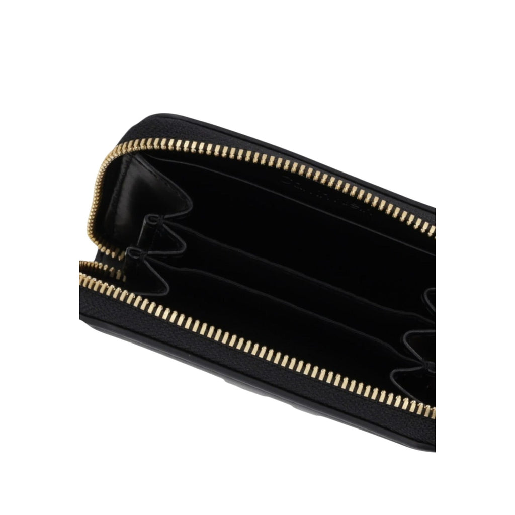 Calvin Klein portemonnee zwart met knopen • size (cm): 10x7x2