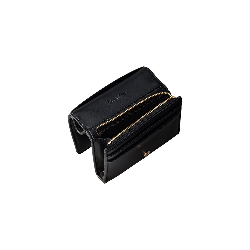 Calvin Klein portemonnee zwart met knopen • zakken: binnenzakken • size (cm): w3 x h9 x l3 (cm)