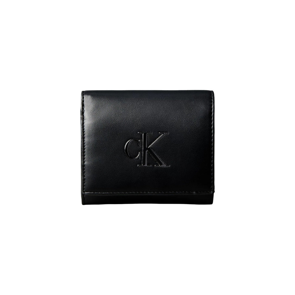 Calvin Klein portemonnee zwart met knopen • zakken: binnenzakken • size (cm): w3 x h9 x l3 (cm)