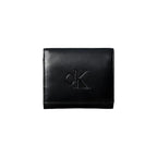 Calvin Klein portemonnee zwart met knopen • zakken: binnenzakken • size (cm): w3 x h9 x l3 (cm)