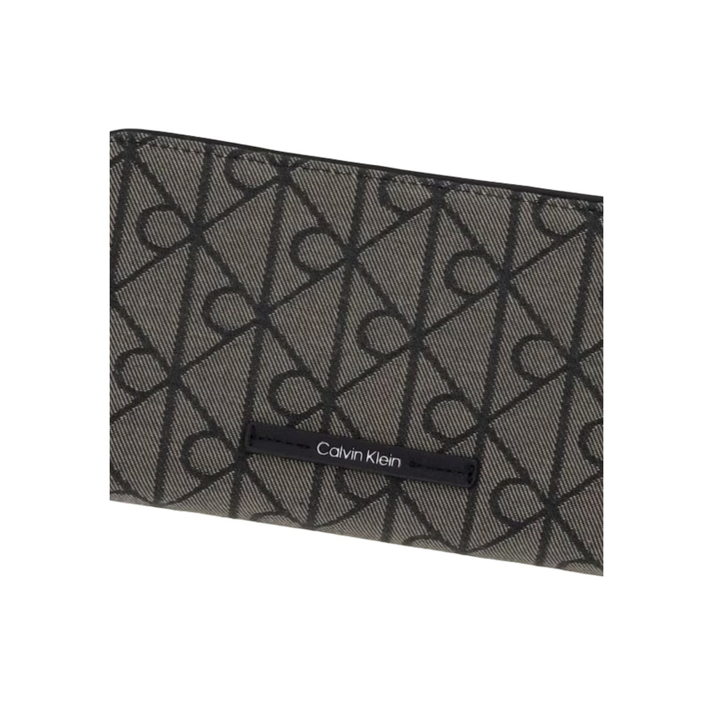 Calvin Klein portemonnee zwart met knopen • zakken: binnenzakken • size (cm): w2 x h11 x l2 (cm)